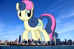 Size: 2048x1365 | Tagged: safe, artist:frownfactory, artist:jaredking779, derpibooru import, bon bon, sweetie drops, earth pony, pony, background pony, chicago, female, giant bon bon (sweetie drops), giant pony, giant/macro earth pony, giantess, highrise ponies, illinois, image, irl, jpeg, looking at you, macro, mare, mega bon bon, mega giant, photo, ponies in real life, smiling, solo