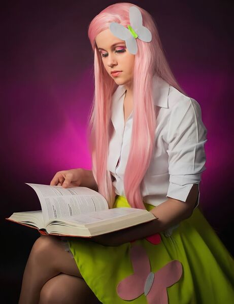 Size: 1660x2160 | Tagged: safe, artist:mauscosplay, derpibooru import, fluttershy, human, equestria girls, book, clothes, cosplay, costume, image, irl, irl human, jpeg, photo, reading, solo