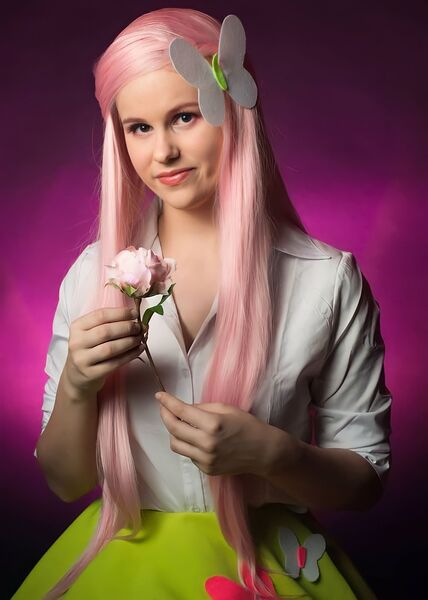 Size: 1542x2160 | Tagged: safe, artist:mauscosplay, derpibooru import, fluttershy, human, equestria girls, clothes, cosplay, costume, flower, image, irl, irl human, jpeg, photo, rose, solo