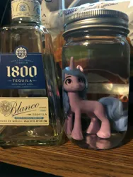 Size: 3024x4032 | Tagged: artist needed, suggestive, derpibooru import, izzy moonbow, pony, unicorn, my little pony: a new generation, alcohol, drink, experiment, female, figure, food, funny, g5, horn, image, insanity, irl, jar, jpeg, mare, meme, photo, tail, tequila, toy, unicorn horn, what were you thinking, wtf