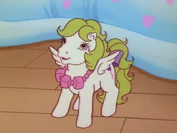 Size: 960x720 | Tagged: safe, derpibooru import, screencap, baby surprise, pegasus, pony, escape from catrina, my little pony 'n friends, baby, baby pony, bow, female, filly, foal, g1, image, jewelry, necklace, png, solo, spread wings, tail, tail bow, wings