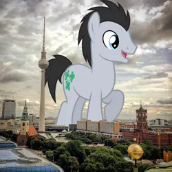 Size: 1080x1080 | Tagged: safe, artist:dashiesparkle, artist:jaredking779, derpibooru import, lucky clover, earth pony, pony, background pony, berlin, germany, giant pony, giant/macro earth pony, highrise ponies, image, irl, jpeg, macro, male, mega giant, open mouth, photo, ponies in real life, raised hoof, smiling, solo, stallion