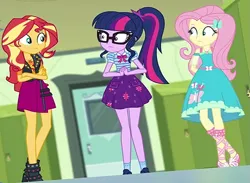 Size: 923x677 | Tagged: safe, derpibooru import, screencap, fluttershy, sci-twi, sunset shimmer, twilight sparkle, human, equestria girls, equestria girls series, holidays unwrapped, spoiler:eqg series (season 2), clothes, cropped, female, fluttershy boho dress, glasses, image, o come all ye squashful, png, polo shirt, ponytail, skirt, teenager, trio, trio female