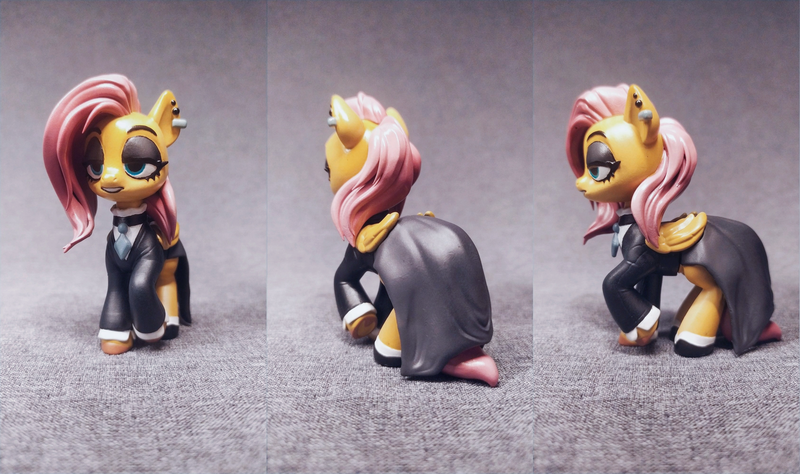 Size: 3377x2000 | Tagged: safe, artist:fluffyorbiter, derpibooru import, fluttershy, pony, 3d print, art, clothes, collage, craft, cyan eyes, diy, dress, ear piercing, earring, eyebrows, eyeshadow, female, figurine, fluttergoth, folded wings, goth, gray background, hoof shoes, image, irl, jewelry, lidded eyes, makeup, mare, photo, piercing, pink hair, pink mane, png, raised hoof, sculpture, shirt, simple background, solo, standing, statue, traditional art, wings