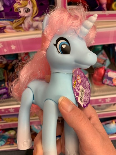 Size: 400x533 | Tagged: safe, derpibooru import, human, pony, unicorn, bootleg, female, hand, image, irl, irl human, jpeg, mare, photo, shelf, solo, tinsel, zuru sparkle girlz