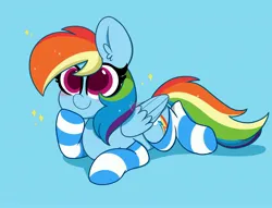 Size: 4096x3128 | Tagged: safe, artist:kittyrosie, derpibooru import, rainbow dash, pegasus, pony, backwards cutie mark, blue background, blushing, clothes, colored pupils, cute, dashabetes, ear fluff, female, folded wings, g4, high res, image, jpeg, lying down, mare, prone, raised hoof, simple background, smiling, socks, solo, striped socks, tail, wings