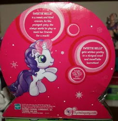 Size: 731x750 | Tagged: safe, derpibooru import, sweetie belle (g3), pony, unicorn, g3, box, female, filly, foal, g3.5, hasbro, hasbro logo, image, jpeg, logo, merchandise, snow, snowflake, solo, standing on two hooves, text