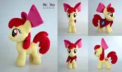 Size: 2000x1179 | Tagged: safe, artist:meplushyou, derpibooru import, apple bloom, earth pony, pony, cape, clothes, cmc cape, female, filly, foal, image, irl, jpeg, photo, plushie, solo