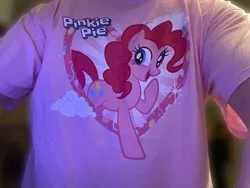 Size: 828x621 | Tagged: safe, artist:thebronypony123, derpibooru import, pinkie pie, earth pony, pony, clothes, image, jpeg, merchandise, shirt, solo, t-shirt