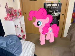 Size: 828x621 | Tagged: safe, artist:thebronypony123, derpibooru import, pinkie pie, pony, bedroom, call of duty, call of duty: ghosts, collection, figure, gameloft, image, irl, jpeg, photo, poster, solo