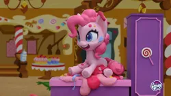 Size: 1920x1080 | Tagged: safe, derpibooru import, screencap, pinkie pie, earth pony, pony, my little pony: pony life, my little pony: stop motion short, cake, cute, food, image, png, smiling, solo, sugarcube corner