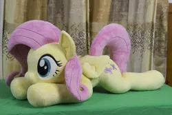 Size: 5184x3456 | Tagged: safe, artist:azgchip, derpibooru import, fluttershy, pegasus, pony, cute, female, g4, image, lying down, mare, photo, plushie, png, prone, shyabetes, solo, sploot