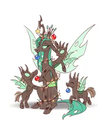 Size: 1000x1217 | Tagged: safe, artist:28gooddays, derpibooru import, queen chrysalis, changeling, changeling queen, bipedal, bipedal leaning, christmas, christmas changeling, christmas lights, christmas ornament, cute, cuteling, decoration, eyes closed, female, g4, holiday, image, leaning, mommy chrissy, mouth hold, png, simple background, smiling, spread wings, white background, wings