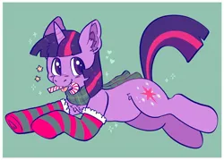 Size: 1852x1329 | Tagged: safe, artist:spookyfoxinc, derpibooru import, twilight sparkle, pony, unicorn, candy, candy cane, christmas, clothes, food, g4, hearth's warming, holiday, image, jpeg, scarf, simple background, socks, solo