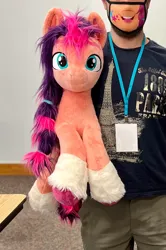 Size: 1184x1781 | Tagged: safe, artist:epicrainbowcrafts, derpibooru import, sunny starscout, earth pony, human, pony, g5, convention, cropped, female, image, irl, irl human, life size, mare, mask, photo, plushie, png, solo focus, trotcon, unshorn fetlocks
