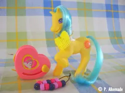 Size: 761x565 | Tagged: safe, derpibooru import, earth pony, pony, bead machine, beads, comb, female, g2, image, irl, jpeg, mare, photo, raised hoof, smiling, solo, springly, tail, toy, unshorn fetlocks