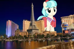 Size: 2249x1500 | Tagged: safe, artist:thatguy1945, artist:theotterpony, derpibooru import, coco pommel, earth pony, pony, bag, female, giant pony, giantess, highrise ponies, image, irl, jpeg, las vegas, macro, mare, necktie, nevada, photo, ponies in real life, saddle bag, smiling, solo