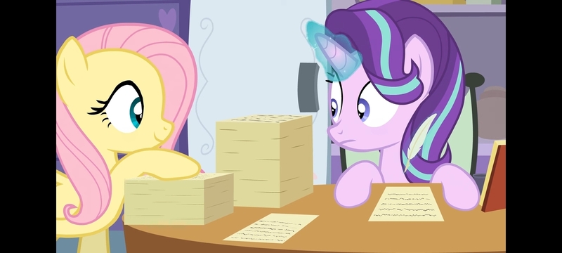 Size: 1600x720 | Tagged: safe, artist:agrol, derpibooru import, screencap, fluttershy, starlight glimmer, pegasus, unicorn, element of kindness, female, glow, glowing horn, horn, image, jpeg, looking at each other, looking at someone, paper, paperwork, school of friendship