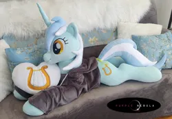 Size: 1280x893 | Tagged: safe, artist:purplenebulastudios, derpibooru import, lyra heartstrings, pony, unicorn, clothes, dig the swell hoodie, hoodie, image, irl, jpeg, life size, lying down, photo, pillow, plushie, prone, solo, sploot