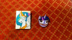 Size: 4000x2250 | Tagged: safe, artist:fluffyorbiter, derpibooru import, princess celestia, twilight sparkle, princess molestia, badge, faic, image, jpeg, merchandise, pins, pudding face