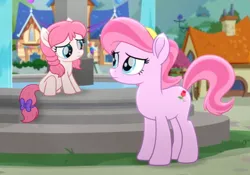 Size: 449x314 | Tagged: safe, derpibooru import, screencap, tulip bulb, tulip rose, earth pony, pony, rainbow roadtrip, bow, cropped, duo, female, filly, foal, fountain, g4, hope hollow, house, image, looking at each other, looking at someone, mare, mother and child, mother and daughter, outdoors, png, raised hoof, sad, sitting, tail, tail bow, water