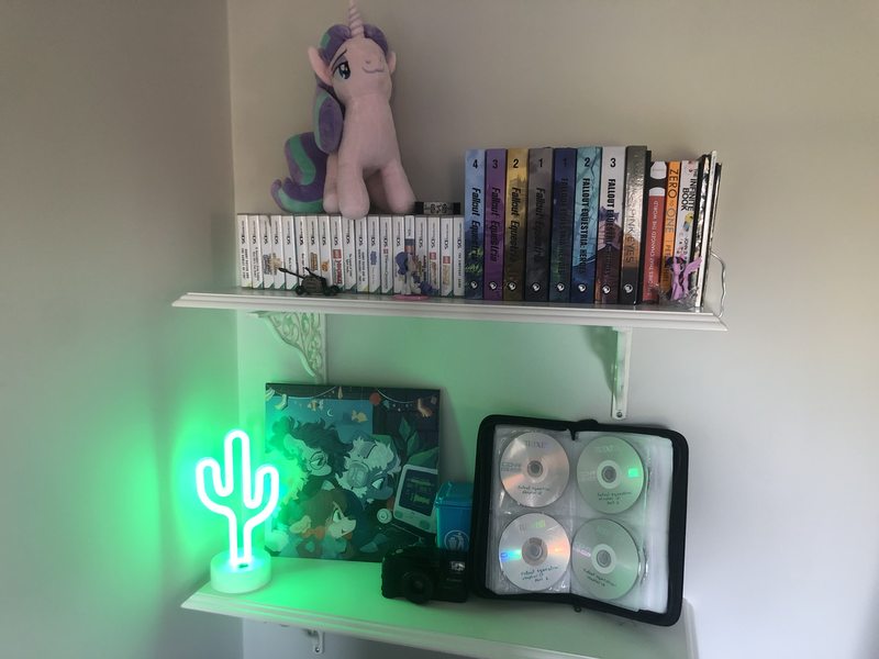 Size: 4032x3024 | Tagged: safe, derpibooru import, rarity, starlight glimmer, twilight sparkle, yona, pony, fallout equestria, book, bookshelf, cactus, camera, cd, figurine, image, irl, neon, photo, plushie, png, record, shelf