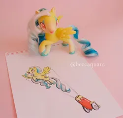 Size: 1080x1036 | Tagged: safe, artist:beccaintoyland, derpibooru import, oc, unnamed oc, pegasus, pony, my little pony: pony life, cannon, circus, clown, copic, curly mane, customized toy, drawing, facial markings, g4, image, irl, jpeg, party cannon, photo, red eyes, solo, toy, traditional art