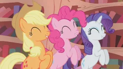 Size: 1280x720 | Tagged: safe, derpibooru import, screencap, applejack, pinkie pie, rarity, earth pony, unicorn, dragonshy, ^^, applejack's hat, bipedal, cowboy hat, eyes closed, golden oaks library, happy, hat, hind legs, horses doing horse things, image, library, png, rearing, trio