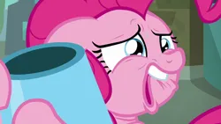 Size: 1280x720 | Tagged: safe, derpibooru import, screencap, pinkie pie, the gift of the maud pie, debating, faic, female, floppy ears, hug, image, lip bite, manehattan, party cannon, png, sad, sentimental value, solo, sweat