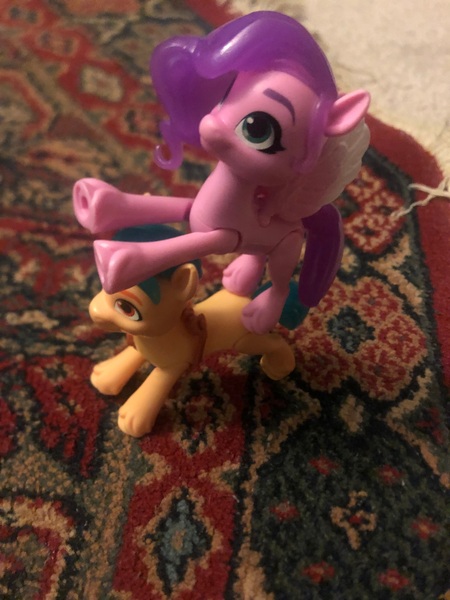 Size: 3024x4032 | Tagged: safe, derpibooru import, hitch trailblazer, pipp petals, earth pony, pegasus, pony, g5, boost, carpet, duo, duo female and male, female, friends, image, irl, jpeg, just friends, male, mare, not shipping, photo, pipp is tall, pipp petals gets a boost, ponies on top of ponies, pony on a pony, pony pile, reaching, reaching for the unknown, rug, stallion, tower of pony, toy