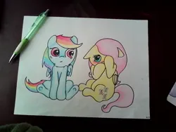 Size: 1280x960 | Tagged: safe, artist:fluttersdoodles, derpibooru import, fluttershy, rainbow dash, blushing, eye contact, female, flutterdash, image, jpeg, lesbian, looking at each other, looking at someone, pencil drawing, shipping, shy, sitting, traditional art