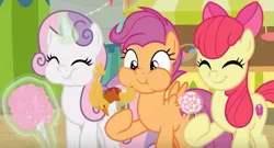 Size: 1400x757 | Tagged: safe, derpibooru import, screencap, apple bloom, scootaloo, sweetie belle, earth pony, pegasus, pony, unicorn, growing up is hard to do, season 9, spoiler:s09, adorabloom, aweeg*, candy, caramel apple (food), carrot, carrot dog, chewing, close-up, cotton candy, cropped, cute, cutealoo, cutie mark, cutie mark crusaders, deep fried, diasweetes, eating, eyes closed, female, food, glow, glowing horn, herbivore, hoof hold, horn, image, jpeg, levitation, lollipop, magic, magic aura, older, older apple bloom, older cmc, older scootaloo, older sweetie belle, puffy cheeks, small wings, smiling, snacks, spread wings, telekinesis, the cmc's cutie marks, trio, trio female, wings