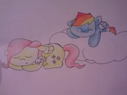 Size: 640x480 | Tagged: safe, artist:fluttersdoodles, derpibooru import, fluttershy, rainbow dash, cloud, eyes closed, female, flutterdash, image, jpeg, lesbian, lying down, lying on a cloud, on a cloud, prone, shipping, sleeping