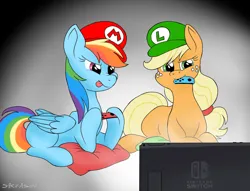 Size: 1024x784 | Tagged: safe, derpibooru import, applejack, rainbow dash, earth pony, pegasus, pony, cap, controller, duo, female, gaming, hat, image, jpeg, luigi's hat, lying down, mare, mario's hat, nintendo switch, open mouth, playing video games, prone, signature, sitting, tongue out
