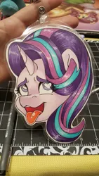 Size: 2988x5312 | Tagged: safe, artist:inkkeystudios, derpibooru import, starlight glimmer, human, pony, unicorn, ahegao, badge, bust, eye clipping through hair, eyes rolling back, heart, heart eyes, image, irl, irl human, jpeg, open mouth, open smile, photo, portrait, smiling, solo, tongue out, traditional art, wingding eyes