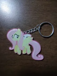 Size: 972x1296 | Tagged: safe, derpibooru import, angel bunny, fluttershy, pegasus, pony, rabbit, animal, cute, eyes open, female, image, irl, jpeg, keychain, mare, merchandise, photo, wings