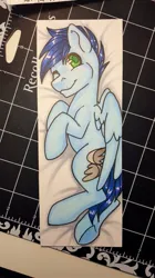 Size: 381x678 | Tagged: safe, derpibooru import, oc, oc:slipstream, unofficial characters only, pegasus, pony, body pillow, body pillow design, image, jpeg, looking at you, one eye closed, photo, smiling, solo, traditional art, underhoof, wink, winking at you