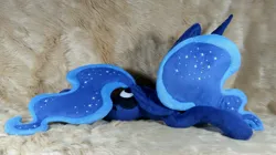 Size: 4096x2289 | Tagged: safe, artist:doctorkoda, derpibooru import, princess luna, alicorn, pony, commission, female, folded wings, horn, image, irl, jpeg, lying down, mare, peytral, photo, plushie, prone, solo, wings