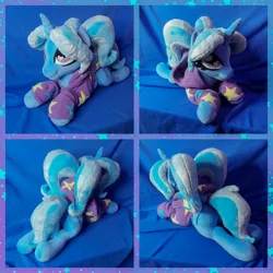 Size: 2048x2048 | Tagged: safe, artist:hellishnya, derpibooru import, trixie, pony, unicorn, alternate hairstyle, babysitter trixie, clothes, female, hoodie, horn, image, irl, jpeg, lying down, mare, photo, pigtails, plushie, prone, solo
