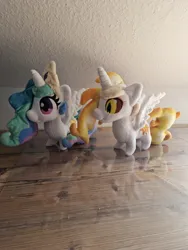 Size: 1536x2048 | Tagged: safe, artist:varonya, derpibooru import, daybreaker, princess celestia, alicorn, pony, duo, duo female, female, horn, image, irl, jewelry, jpeg, mare, photo, plushie, spread wings, standing, tiara, wings