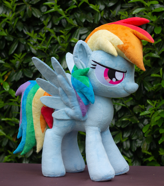 Size: 2775x3153 | Tagged: safe, artist:rtryart, derpibooru import, rainbow dash, pegasus, pony, female, image, irl, jpeg, mare, outdoors, photo, plushie, smiling, solo, spread wings, standing, wings