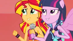 Size: 1920x1080 | Tagged: safe, derpibooru import, screencap, sunset shimmer, twilight sparkle, equestria girls, rainbow rocks, bare shoulders, clothes, female, image, jpeg, sleeveless, solo