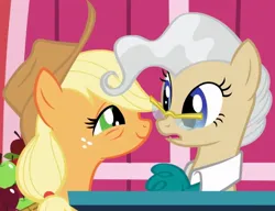 Size: 795x610 | Tagged: safe, derpibooru import, screencap, applejack, mayor mare, earth pony, pony, applebuck season, season 1, apple, bags under eyes, basket, cropped, duo, duo female, eye contact, female, food, glasses, image, jpeg, lidded eyes, looking at each other, looking at someone, mare, out of context, podium, smiling, tired