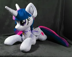 Size: 1636x1302 | Tagged: safe, artist:doctorkoda, derpibooru import, twilight sparkle, twilight sparkle (alicorn), alicorn, pony, female, folded wings, happy, horn, image, irl, jpeg, lying down, mare, photo, plushie, prone, smiling, solo, wings