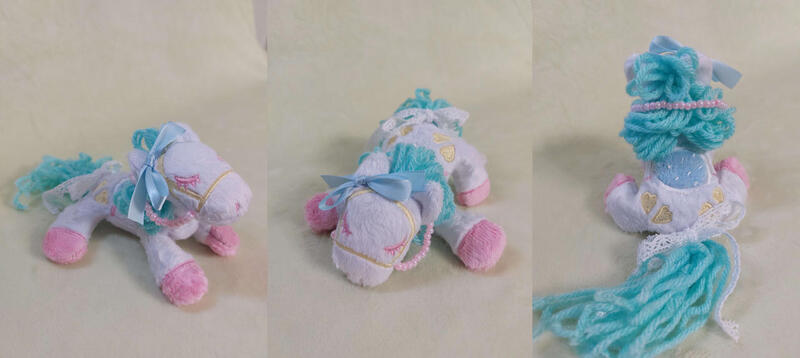 Size: 1280x573 | Tagged: safe, artist:starfulstitches, derpibooru import, oc, earth pony, pony, female, image, jpeg, lying down, mare, photo, plushie, prone, sitting, solo