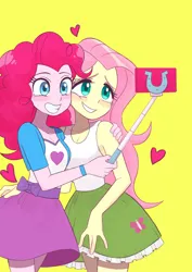 Size: 848x1199 | Tagged: safe, artist:haibaratomoe, derpibooru import, fluttershy, pinkie pie, equestria girls, belt, blushing, clothes, cute, diapinkes, duo, female, flutterpie, grin, heart, image, jpeg, lesbian, mobile phone, phone, selfie, selfie stick, shipping, shyabetes, simple background, skirt, smartphone, smiling, tanktop, yellow background