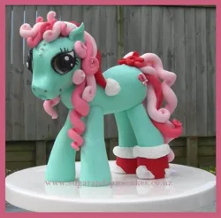 Size: 570x560 | Tagged: safe, derpibooru import, minty, earth pony, pony, g3, bow, cake, christmas, clothes, curly hair, etsy, fondant, food, hat, holiday, image, irl, jpeg, new zealand, pearl, photo, santa hat, socks, solo, tail, tail bow, watermark, website