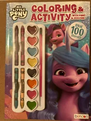 Size: 3024x4032 | Tagged: safe, derpibooru import, izzy moonbow, pipp petals, g5, activity book, book, coloring book, crayons, image, jpeg, my little pony logo, paintbrush, sticker pack, traditional art, watercolor painting