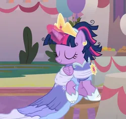 Size: 1248x1184 | Tagged: safe, derpibooru import, screencap, twilight sparkle, twilight sparkle (alicorn), alicorn, pony, the last problem, alternate hairstyle, balloon, banner, bush, clothes, coronation dress, cropped, crown, dress, evening, eyes closed, female, gown, grass, image, jewelry, jpeg, magic, mare, messy mane, raised hoof, regalia, sash, second coronation dress, sitting, smiling, solo, table, turning