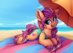 Size: 1375x999 | Tagged: safe, artist:zeepheru_pone, derpibooru import, sunny starscout, earth pony, pony, g5, atg 2023, beach, cheek fluff, chest fluff, clothes, cloud, cute, ear fluff, female, image, looking at you, lying down, mare, newbie artist training grounds, ocean, one-piece swimsuit, png, sky, smiling, solo, summer, swimsuit, umbrella, unshorn fetlocks, water